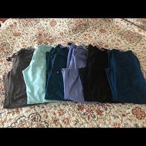 6 pairs of KOI Lindsey Cargos.